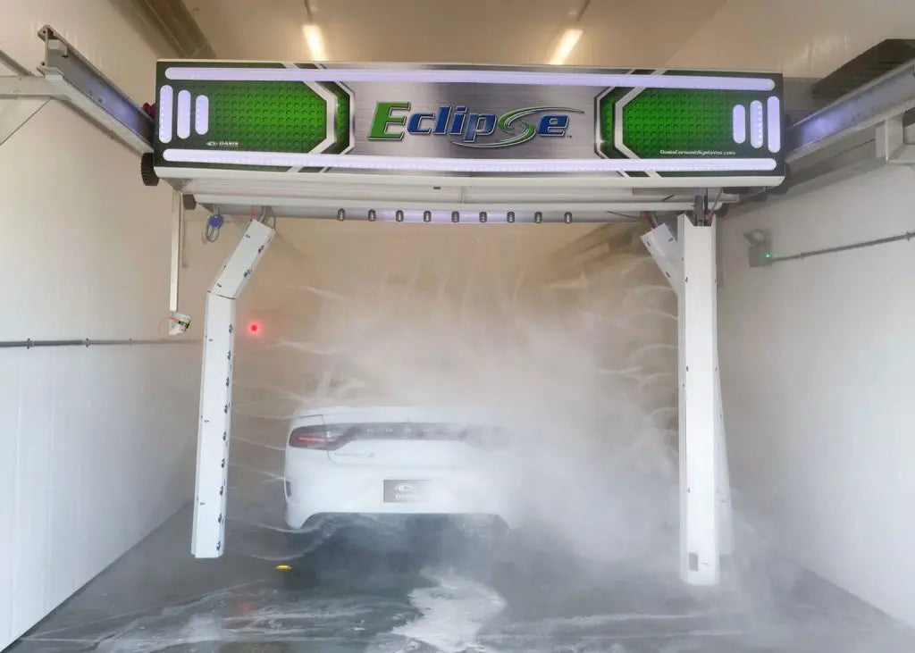 Car entering a touch-free car wash from oasis