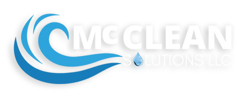 Logo of McClean Solutions with blue wave design and water droplet on a white background. McClean is Wash Dudes car wash chemical supplier
