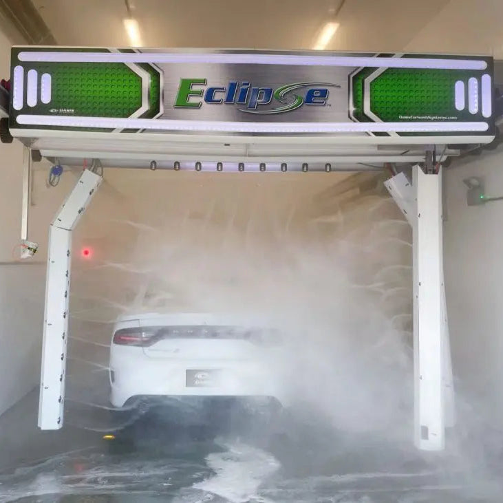 Car entering a touch free eclipse car wash from Oasis